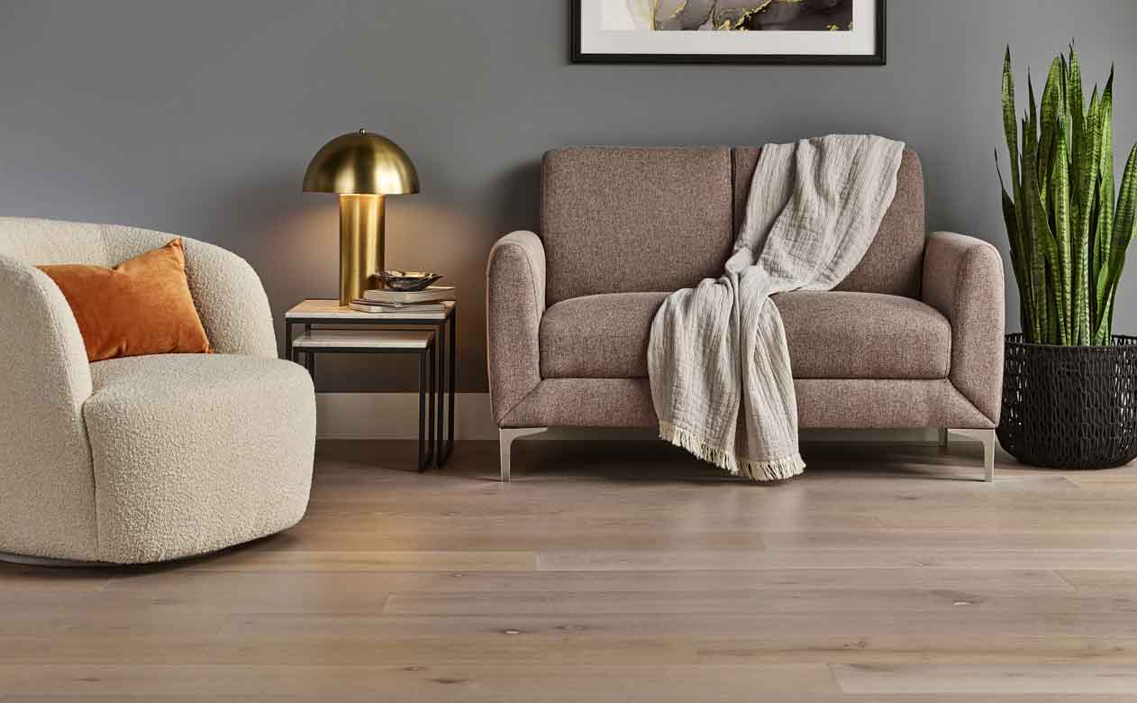 white oak hardwood floor in modern living room with cozy gold lamp